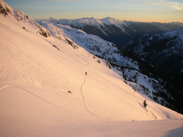 Jason Hummel skins toward the Southern Picket Range bathed in a beautiful January sunset.