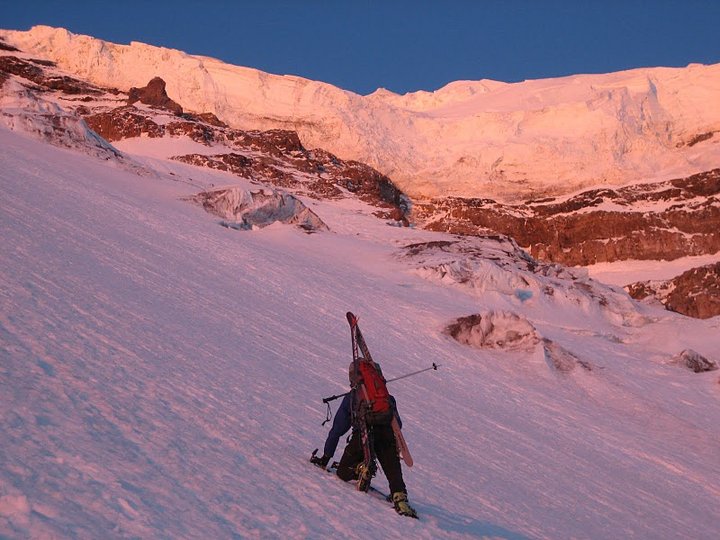 Casey climbs below thumb rock.