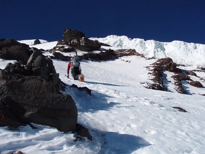 Tony climbs fun firm conditions below the black pyramid (photo by Eric Wehrly)