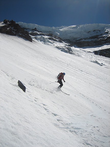 Tony skis perfect corn below thumb rock.