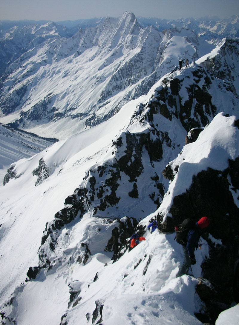 the squad summiting with glorious Goode in the background