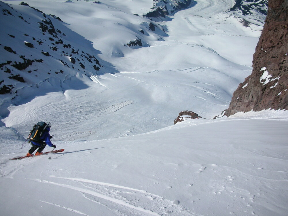 Casey carves a turn below Thumb Rock