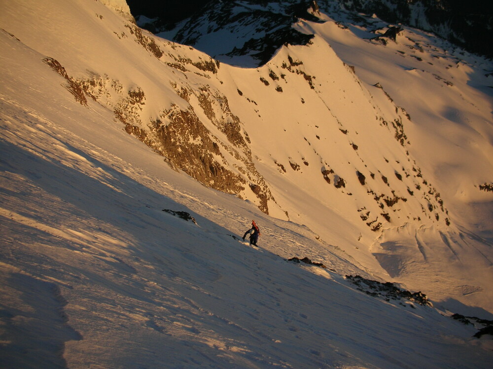 Casey climbs above Thumb Rock at Sunrise